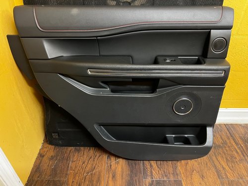 22-24 FORD EXPEDITION LIMITED OEM REAR LEFT BLACK EBONY DOOR PANEL WOODGRAIN