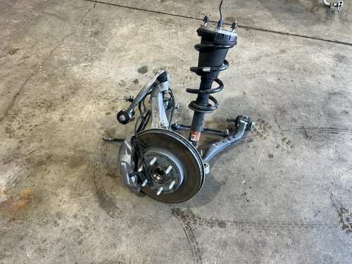 21-26 OEM YUKON TAHOE SUBURBAN FRONT RIGHT PASSENGR KNEE SUSPENSION KNUCKLE ARMS
